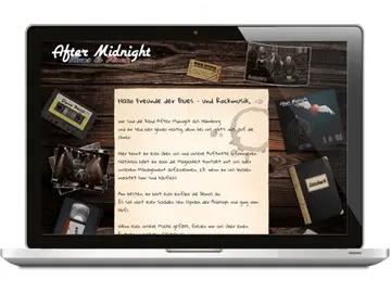 Laptop mit Website der Rockband After Midnight aus Hamburg im Retro-Stil.